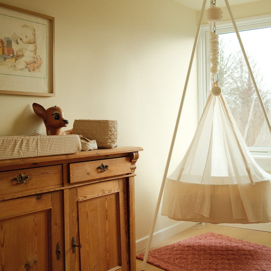 Sistema oscillante con culla - Membantu